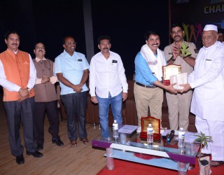 Felicitation of Mr. Hanumantrao Patil (Tahasildar, Baramati) by Hon. Chandrarao Taware